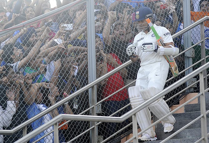 sachin tendulkar walks out to bat in his final test match at the wankhede stadium in mumbai photo courtesy bcci