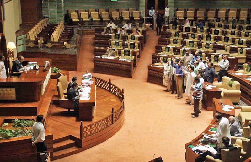 lawmakers of the muttahida qaumi movement protest before the speaker s podium about the disappearance of their party workers photo online