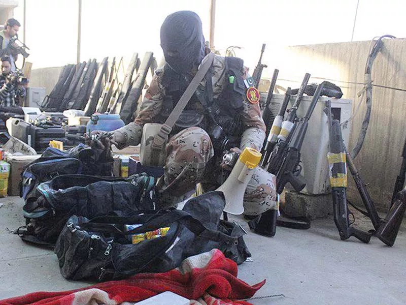 a rangers soldier displays weapons seized during the march 11 raid photo file a rangers soldier displays weapons seized during the march 11 raid photo file