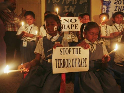 girl burnt after assault by four men