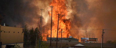 canadian city evacuated as huge blaze engulfs homes