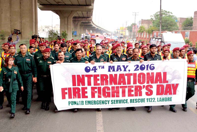 rescue 1122 officials in lahore held a rally on ferozepur road photo express