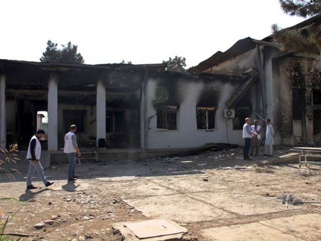 members of medecins sans frontieres msf look inside the damaged compound of a msf hospital in kunduz afghanistan on october 17 2015 photo reuters