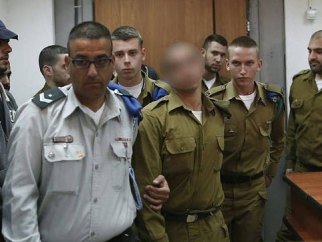 the israeli soldier shot and killed a palestinian assailant who was wounded and lying on the ground in hebron city photo haaretz ilan assayag the israeli soldier shot and killed a palestinian assailant who was wounded and lying on the ground in hebron city photo haaretz ilan assayag