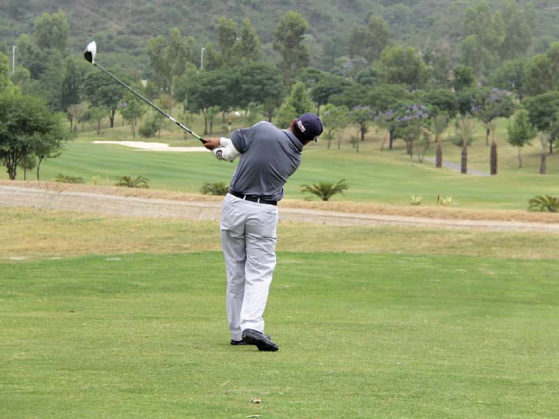 a golfer plays a shot during the 6th chairman bahria town open golf championship photo pr