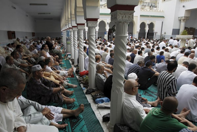 worshippers attend morning prayers of eid al fitr holiday marking the end of the holy month of ramadan at al biar mosque in algiers algeria july 17 2015 photo reuters worshippers attend morning prayers of eid al fitr holiday marking the end of the holy month of ramadan at al biar mosque in algiers algeria july 17 2015 photo reuters
