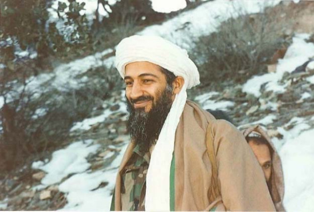 photo of osama bin laden in the tora bora compound where the al qaeda leader lived until a bombing campaign forced him to flee photo abdel bari atwan via justice department