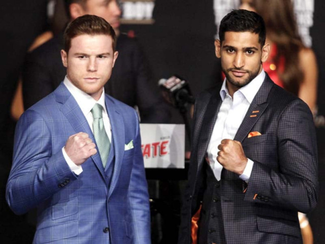 the world title showdown will pit the elusiveness and speed of amir against the brute strength of the naturally bigger alvarez photo afp the world title showdown will pit the elusiveness and speed of amir against the brute strength of the naturally bigger alvarez photo afp