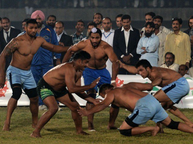 file photo of a pakistani kabbadi player attempting to tag his indian opponents during the kabaddi