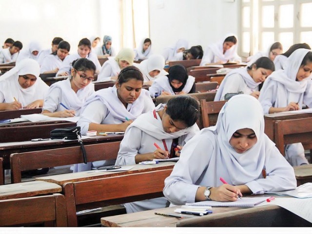 students busy solving question papers during their intermediate examination photo nni file