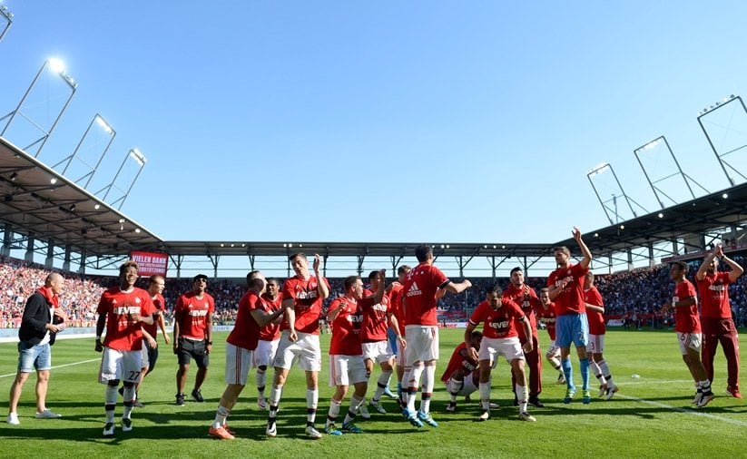 bayern munich players celebrate wining the league for the fourth year in a row after the german first division bundesliga football match between fc ingolstadt 04 and fc bayern munich at the audi sportpark in ingolstadt southern germany photo afp