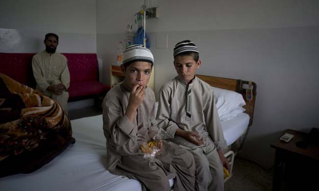 abdul rasheed l nine and shoaib ahmed 13 at a hospital in islamabad photo b k bangash ap