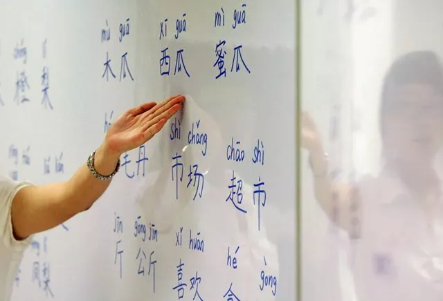 an instructor points out mandarin characters on a whiteboard at a night class for people learning mandarin as a second language in singapore september 1 2009 photo reuters an instructor points out mandarin characters on a whiteboard at a night class for people learning mandarin as a second language in singapore september 1 2009 photo reuters