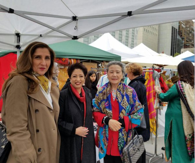 pakistan 039 s ambassador to un dr maleeha lodhi c with wife of un secretary general ban soon taek r at the un international bazaar in new york photo twitter