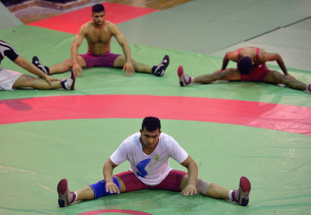2010 commonwealth gold medallist inam front believes lack of support from both government and pakistan wrestling federation pwf left them with a mountain photo afp 2010 commonwealth gold medallist inam front believes lack of support from both government and pakistan wrestling federation pwf left them with a mountain photo afp