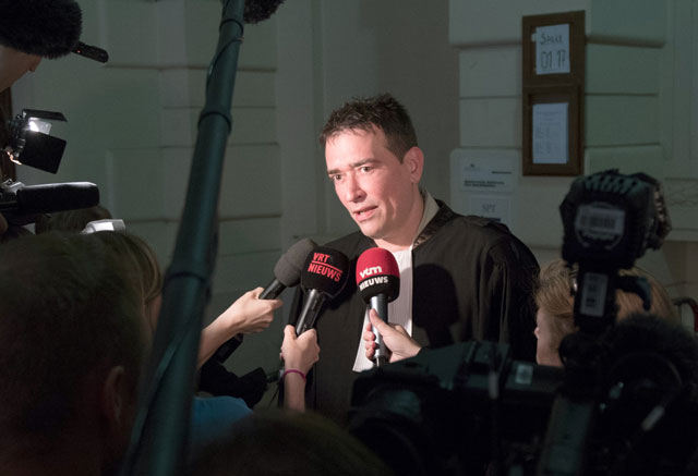 lawyer sebastien courtoy talks to the press at the start of the case against the extremist cell from verviers at the brussels correctional court on may 9 2016 photo afp