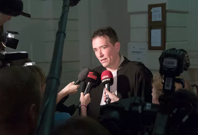 lawyer sebastien courtoy talks to the press at the start of the case against the extremist cell from verviers at the brussels correctional court on may 9 2016 photo afp lawyer sebastien courtoy talks to the press at the start of the case against the extremist cell from verviers at the brussels correctional court on may 9 2016 photo afp