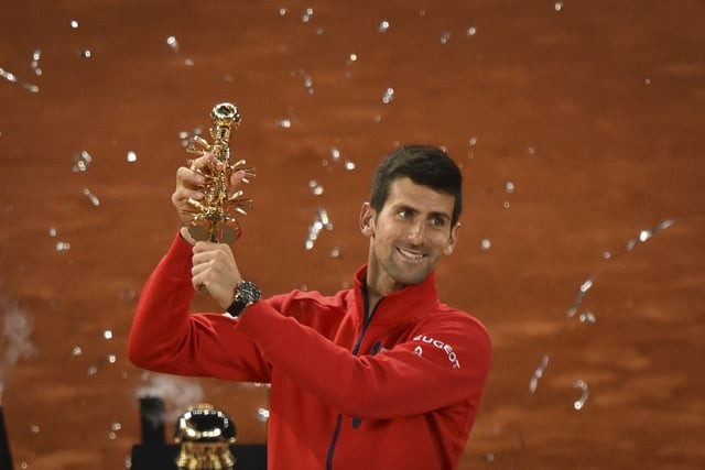 novak djokovic poses with his trophy as he celebrates his victory over andy murray after madrid open men 039 s tennis final at caja magica sports complex in madrid on may 8 2016 photo afp novak djokovic poses with his trophy as he celebrates his victory over andy murray after madrid open men 039 s tennis final at caja magica sports complex in madrid on may 8 2016 photo afp