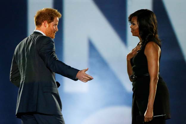 britain 039 s prince harry l and us first lady michelle obama take part in the opening ceremonies of the invictus games in orlando florida us may 8 2016 photo reuters