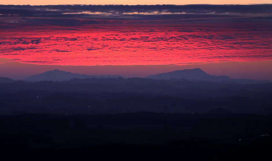 red clouds are pictured at the sunset in the alpine foothills in southern germany photo afp