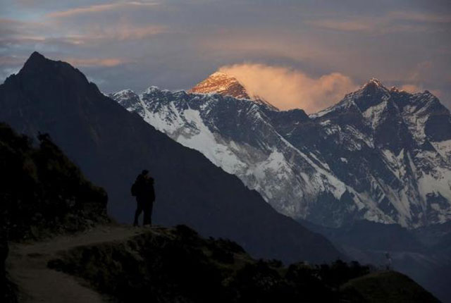 light illuminates mount everest c during sunset in solukhumbu district also known as the everest region in this picture taken november 30 2015 photo reuters