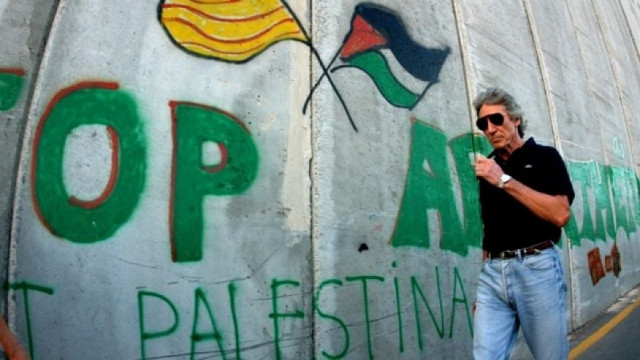 roger waters of pink floyd walks along the israeli barrier in the west bank city of bethlehem june 21 2006 photo reuters roger waters of pink floyd walks along the israeli barrier in the west bank city of bethlehem june 21 2006 photo reuters