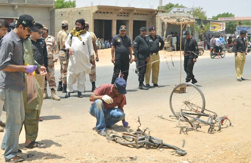 the explosives were attached to the bicycle parked near the colony photo inp