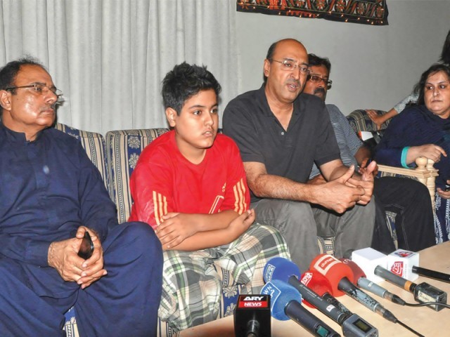 thirteen year old mustafa rizwan recounts to the media how he was kidnapped by a friend he made on facebook as his family looks on photo rashid ajmeri express