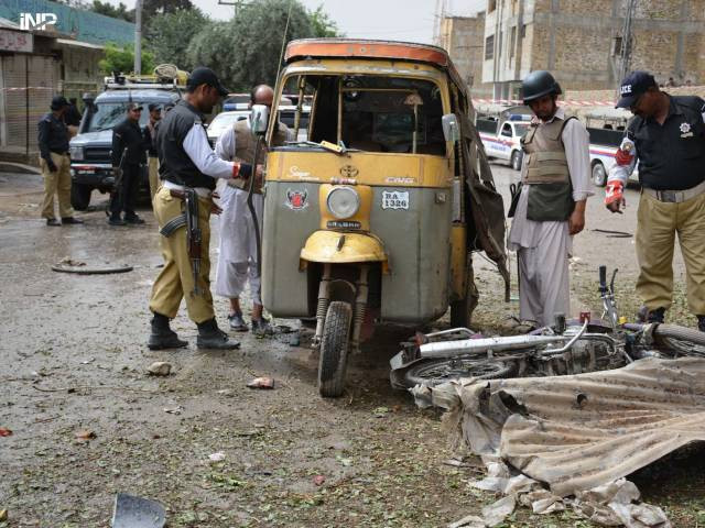 police inspect the blast site in quetta on tuesday photo inp