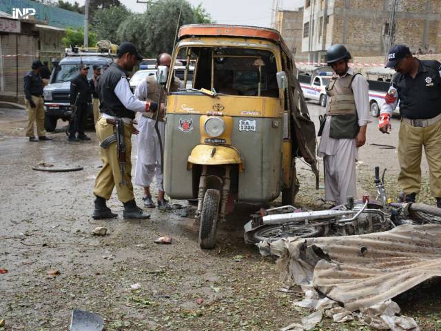 police inspect the blast site in quetta on tuesday photo inp