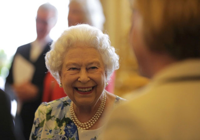 the queen was caught on camera during a garden party at buckingham palace on tuesday making unguarded comments about a chinese state visit photo afp