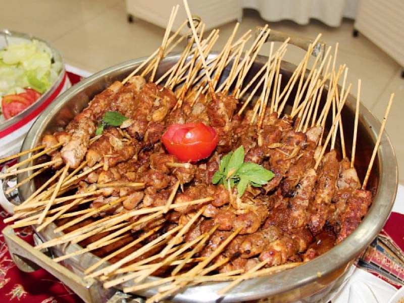 the indonesian version of skewered grilled meat photo express