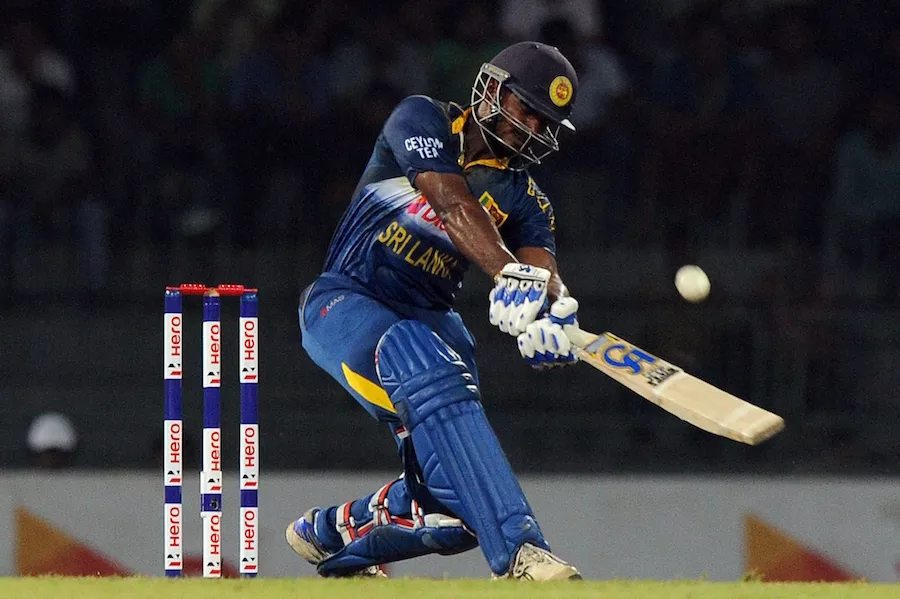kusal perera launches into a lofted shot against west indies in colombo on november 4 2015 photo afp kusal perera launches into a lofted shot against west indies in colombo on november 4 2015 photo afp