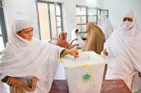 a woman casts her vote in the by polls in ariana village charsadda road photo muhammad iqbal express