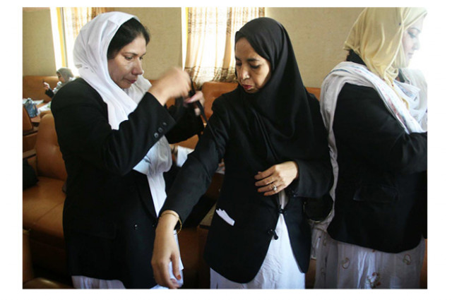 women lawyers tie black ribbons on arms during boycott of court proceedings to mark the anniversary of may 12 incident photo online women lawyers tie black ribbons on arms during boycott of court proceedings to mark the anniversary of may 12 incident photo online