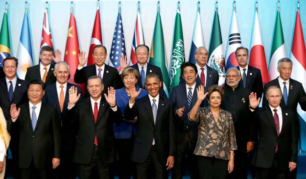 world leaders including chinese president xi jinping us president barack obama and germany s chancellor angela merkel gather for the g20 summit quot family quot photo in antalya turkey photo afp