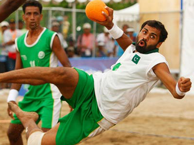 beach hand ball match in progress photo afp