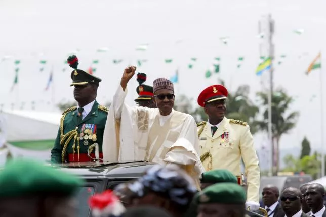 nigeria 039 s new president muhammadu buhari rides on the motorcade while inspecting the guard of honour at eagle square in abuja nigeria may 29 2015 photo reuters nigeria 039 s new president muhammadu buhari rides on the motorcade while inspecting the guard of honour at eagle square in abuja nigeria may 29 2015 photo reuters