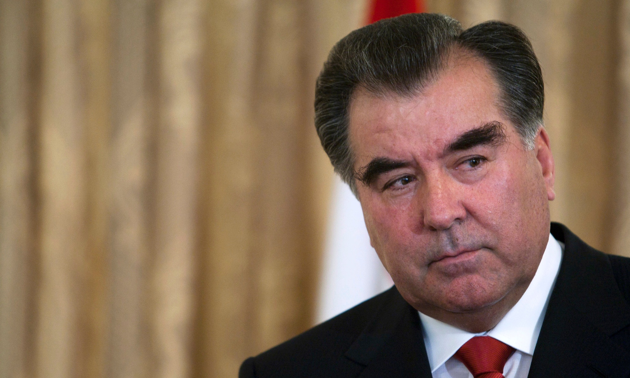 tajikistan president emomali rakhmon listens to his counterpart from afghan president hamid karzai during a joint press conference at the presidential palace on october 25 2010 in kabul afghanistan photo reuters