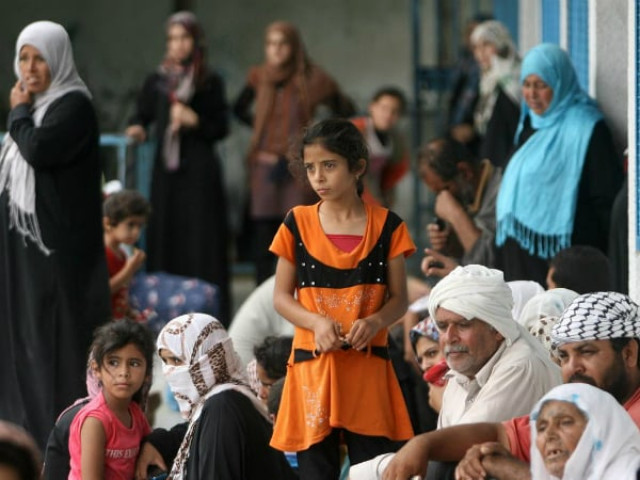 in the state of palestine women men and children find refuge in a school shelter run by the united nations relief and works agency for palestine refugees in the near east unrwa in the town of rafah in southern gaza photo unicef in the state of palestine women men and children find refuge in a school shelter run by the united nations relief and works agency for palestine refugees in the near east unrwa in the town of rafah in southern gaza photo unicef