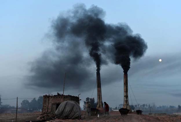 smoke rises form brick kilns in peshawar photo afp file