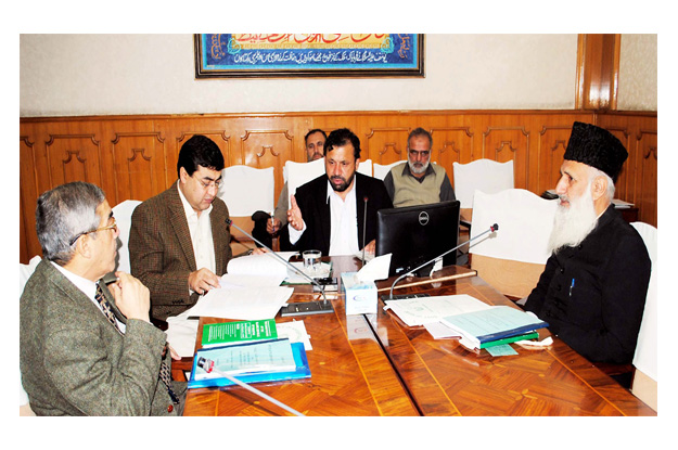 k p finance minister muzaffar presiding over a meeting regarding nfc at civil secretariat photo nni