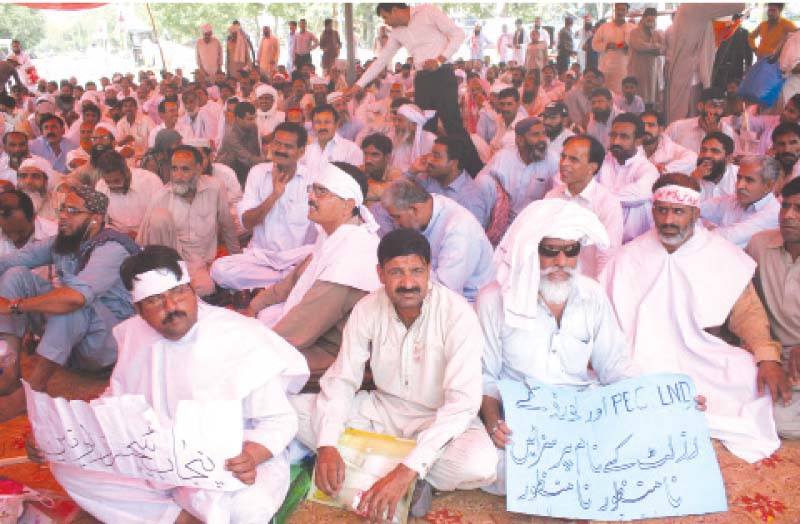 teachers sit outside the punjab assembly on sunday photo express