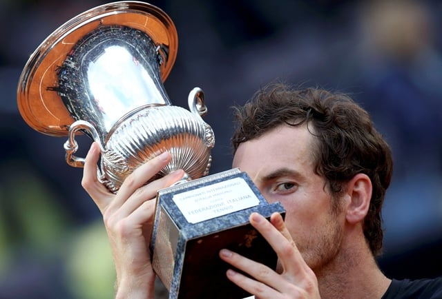 murray kisses the trophy after winning the match photo reuters