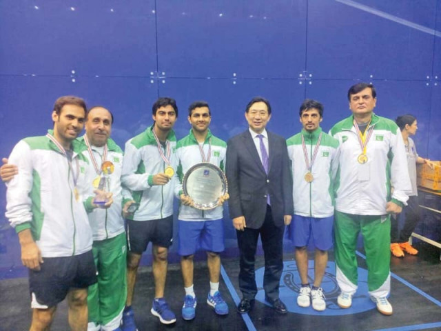 pakistan squash team poses with the trophy after defeating hong kong in the final to secure their 15th asian squash team championship title photo courtesy psf pakistan squash team poses with the trophy after defeating hong kong in the final to secure their 15th asian squash team championship title photo courtesy psf