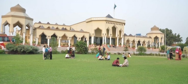 a file photo of students sitting on a university campus photo hired pk a file photo of students sitting on a university campus photo hired pk