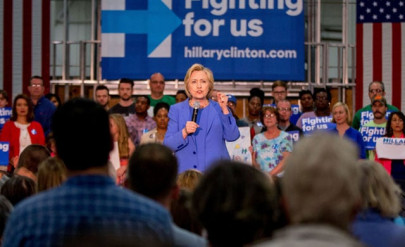 clinton woos blue collar voters in kentucky raps trump