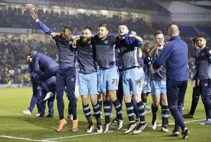 carlos carvalhal s side is one step away from a lucrative place in the premier league thanks to a combative display in the semi final second leg at the amex stadium photo afp