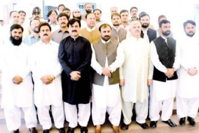kpk assembly lawmakers pose for a photo with deputy speaker sher ali gorchani photo express kpk assembly lawmakers pose for a photo with deputy speaker sher ali gorchani photo express