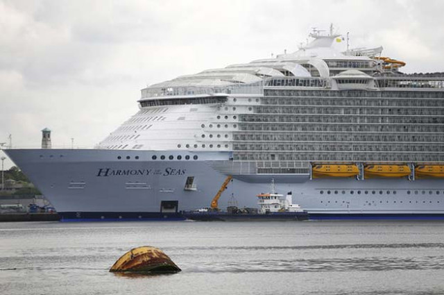 a small boats cruises past the worlds largest cruise ship the 361 metres long harmony of the seas berthed in port ahead of its maiden voyage in southampton britain may 17 2016 photo reuters a small boats cruises past the worlds largest cruise ship the 361 metres long harmony of the seas berthed in port ahead of its maiden voyage in southampton britain may 17 2016 photo reuters